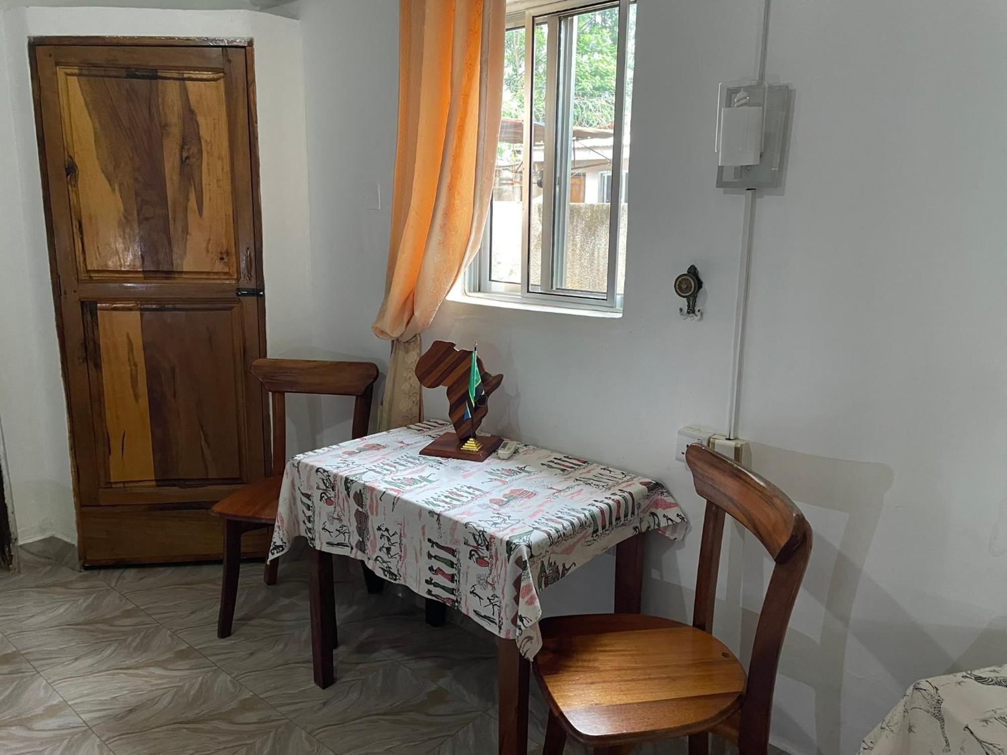 Home Feeling Neneu Lodge Moshi Esterno foto